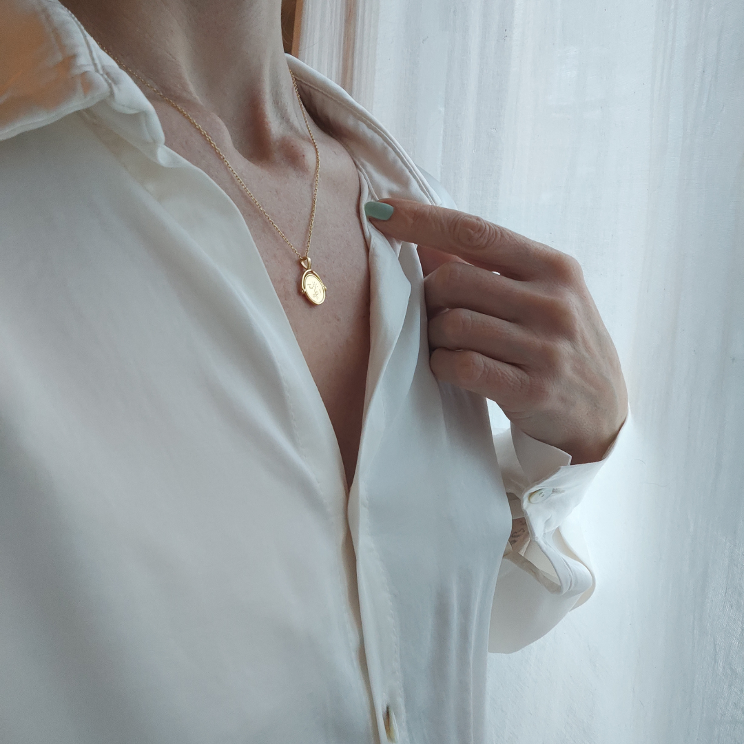 Colgante protector del aura